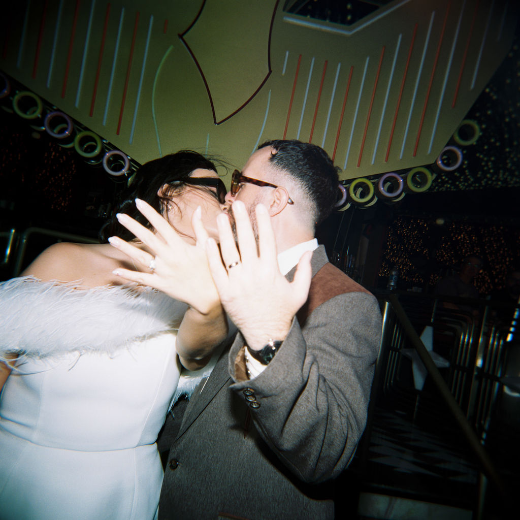 Candid moment from a sure thing chapel elopement filled with laughter and emotion.
