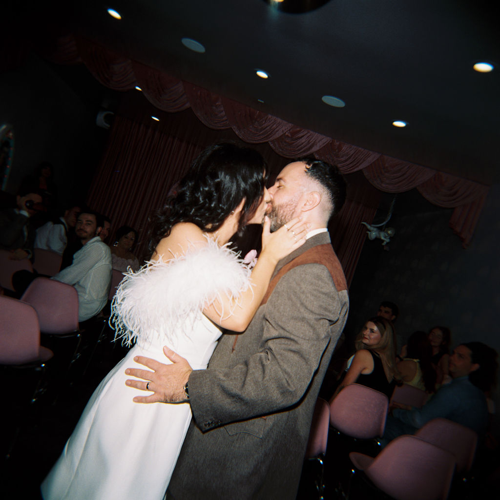 Candid moment from a sure thing chapel elopement filled with laughter and emotion.
