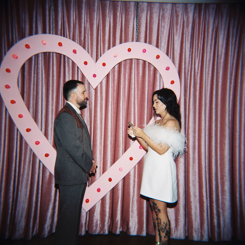 Candid moment from a sure thing chapel elopement filled with laughter and emotion.
