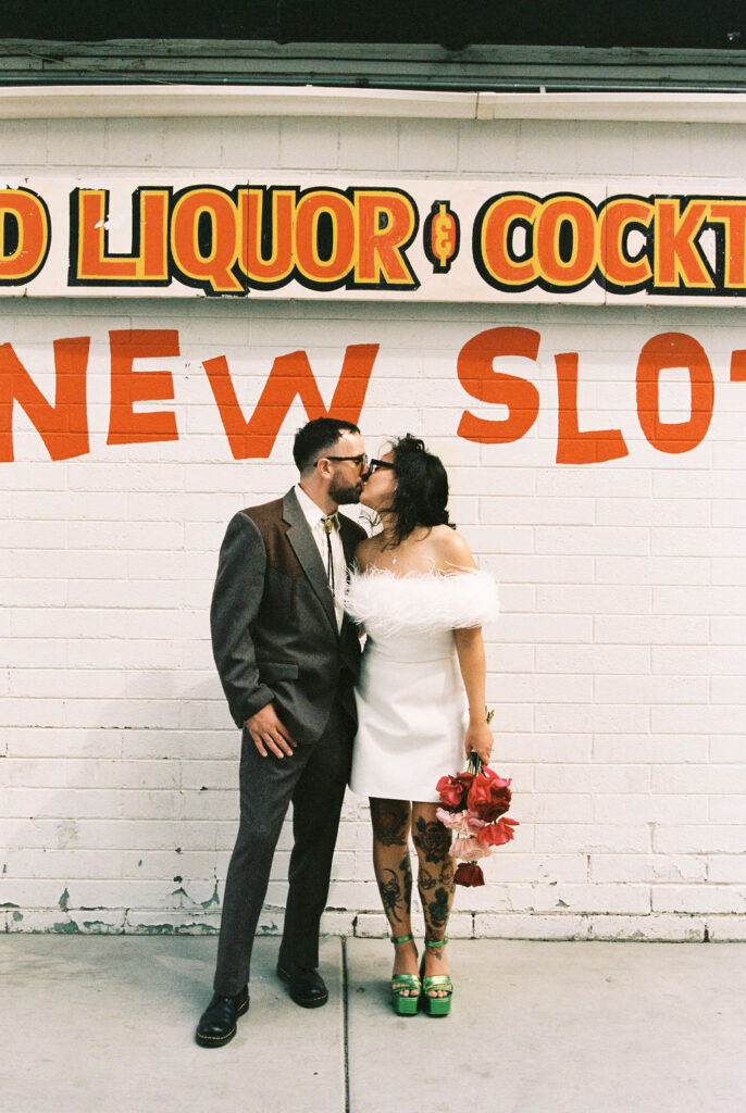 Candid moment from a sure thing chapel elopement filled with laughter and emotion.
