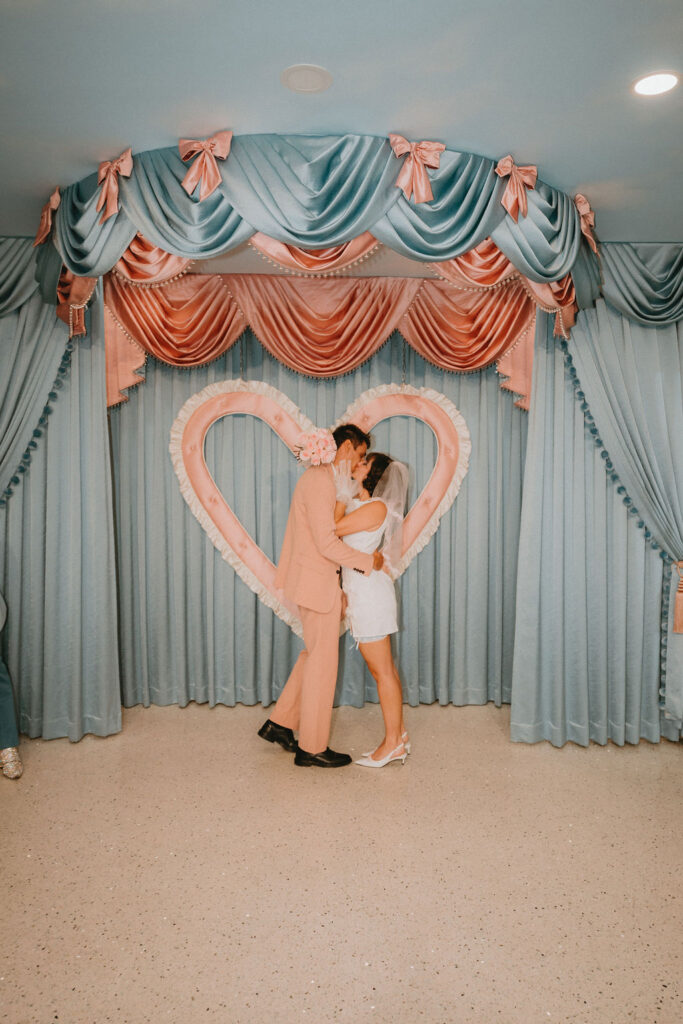 Couple sharing an intimate moment during their Sure Thing Too elopement in Las Vegas.