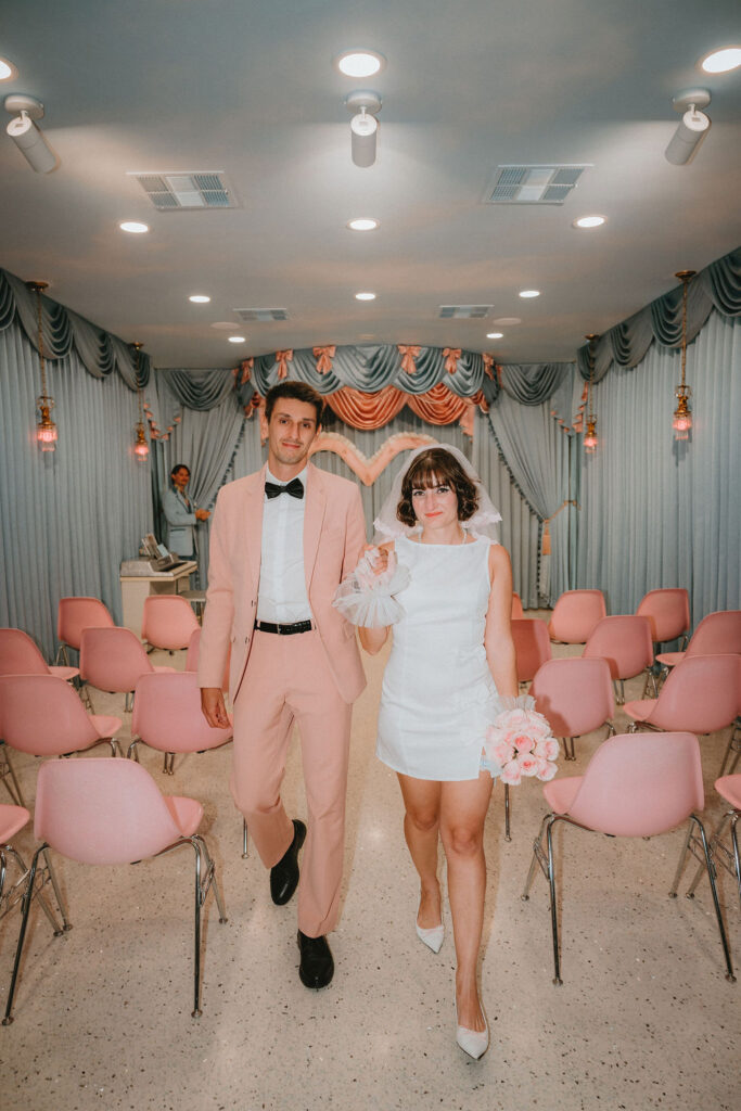 Couple sharing an intimate moment during their Sure Thing Too elopement in Las Vegas.