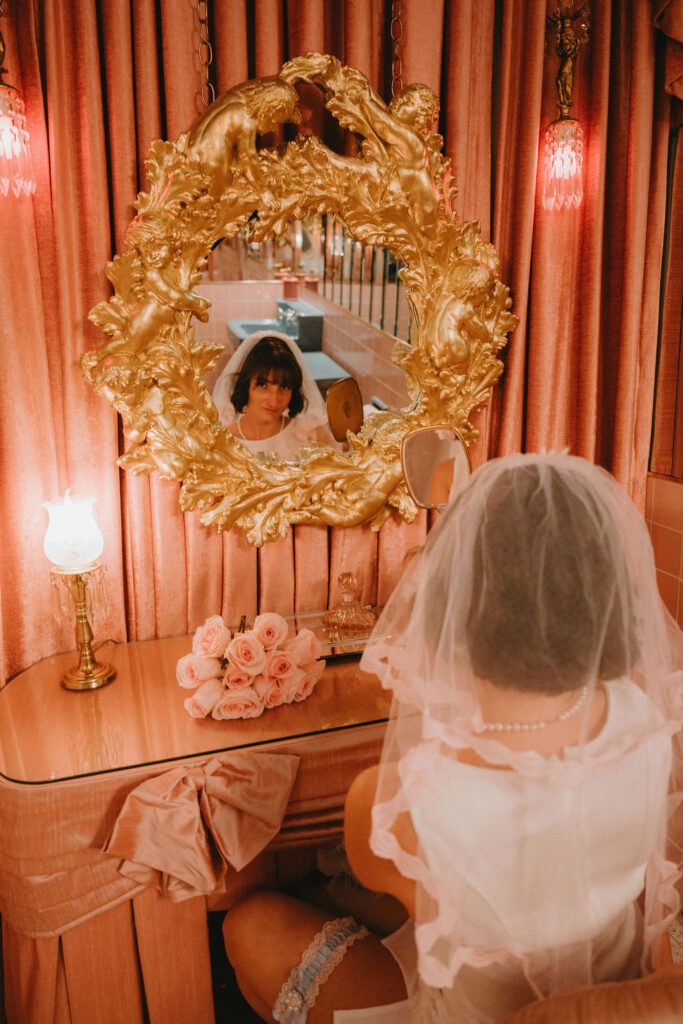 Candid elopement photos inside Sure Thing Too chapel with romantic pastel details.