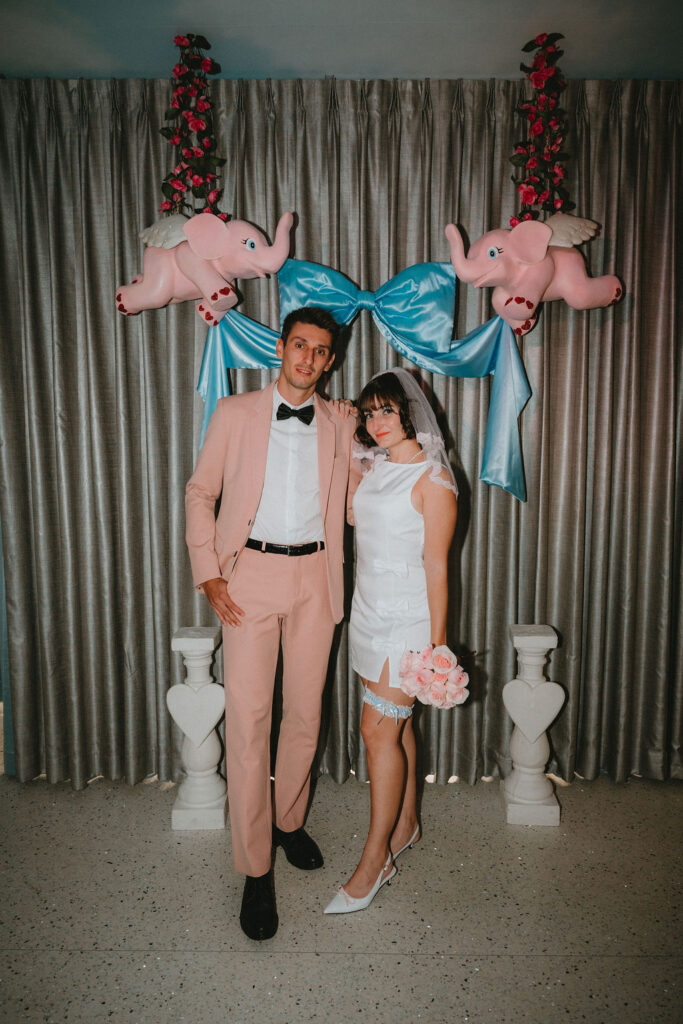 Candid elopement photos inside Sure Thing Too chapel with romantic pastel details.
