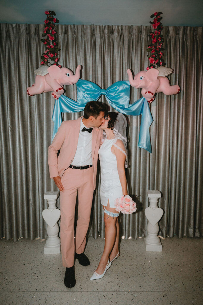 Newly married couple celebrating wedding in downtown Las Vegas.
