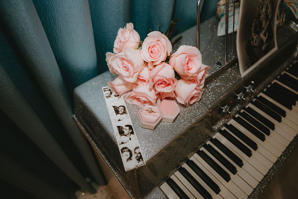 Candid elopement photos inside Sure Thing Too chapel with romantic pastel details.
