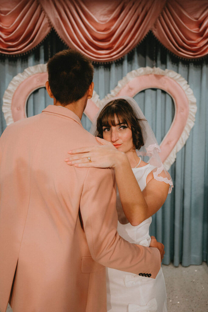 Newly married couple celebrating wedding in downtown Las Vegas.
