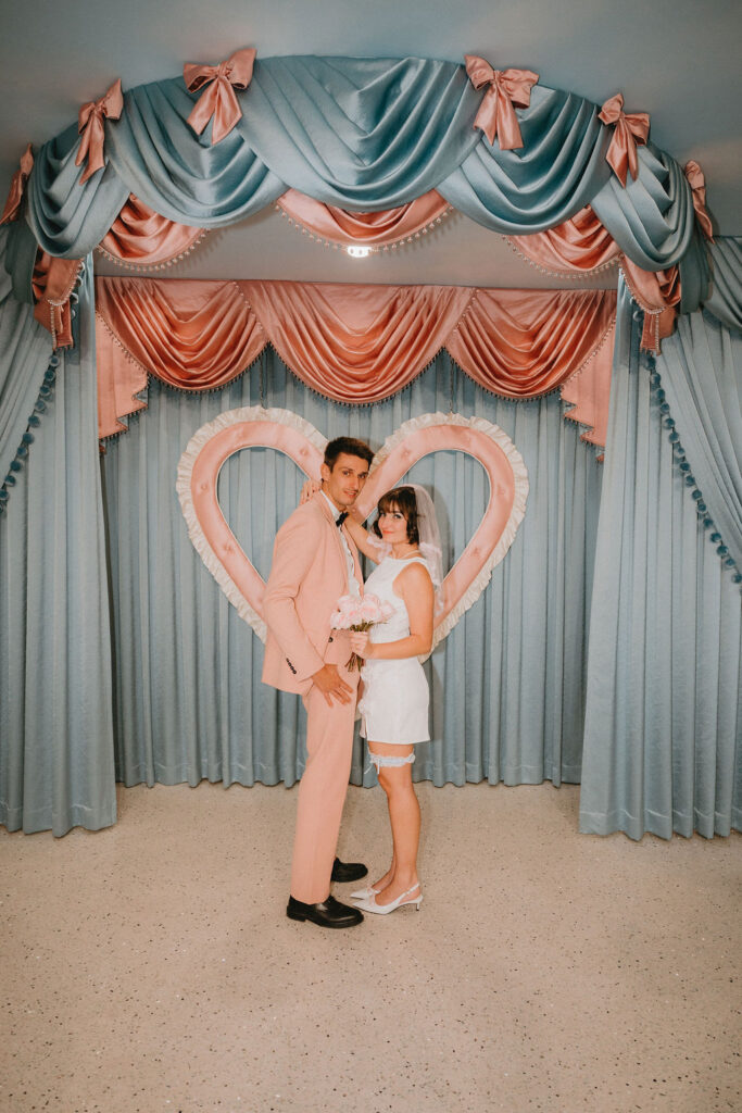Newly married couple celebrating wedding in downtown Las Vegas.
