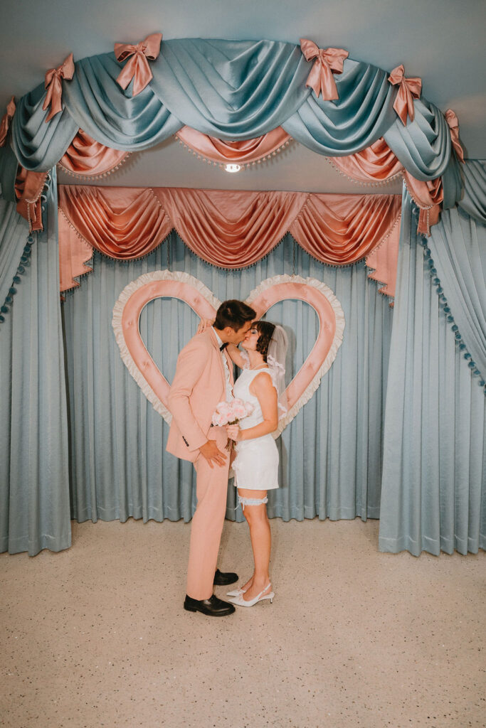 Newly married couple celebrating wedding in downtown Las Vegas.
