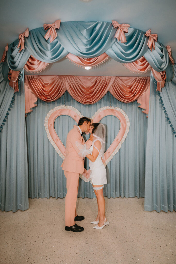 Newly married couple celebrating wedding in downtown Las Vegas.
