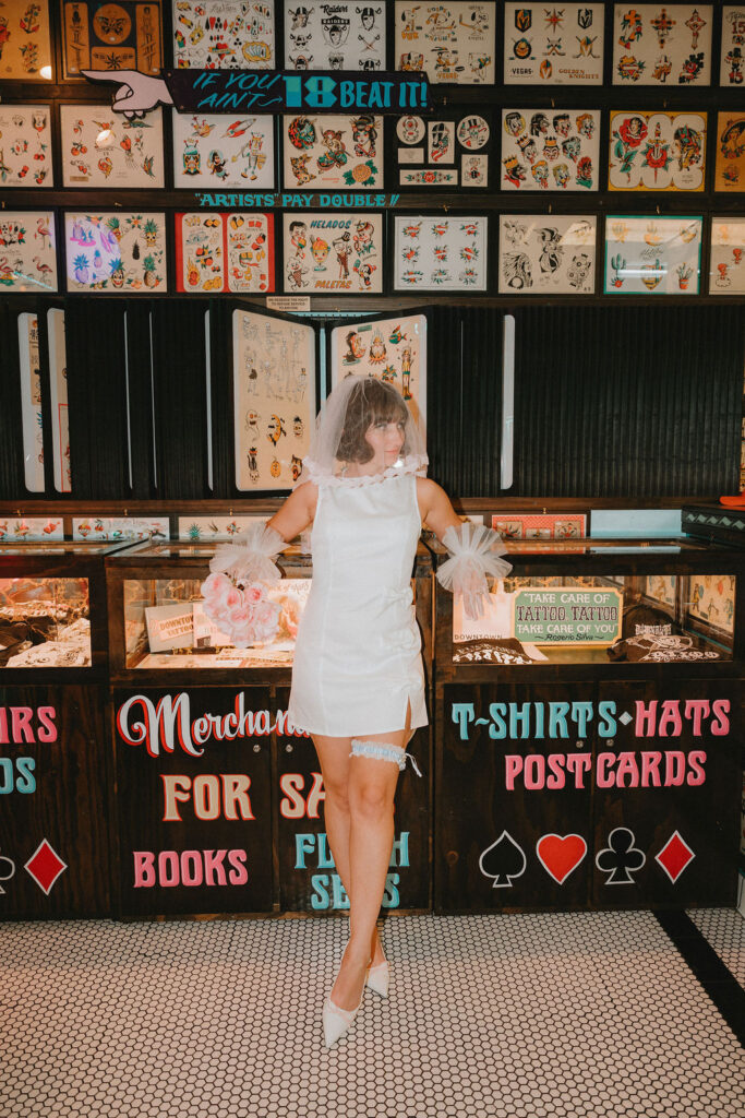 Couple marking their Las Vegas wedding with tattoos after the ceremony.
