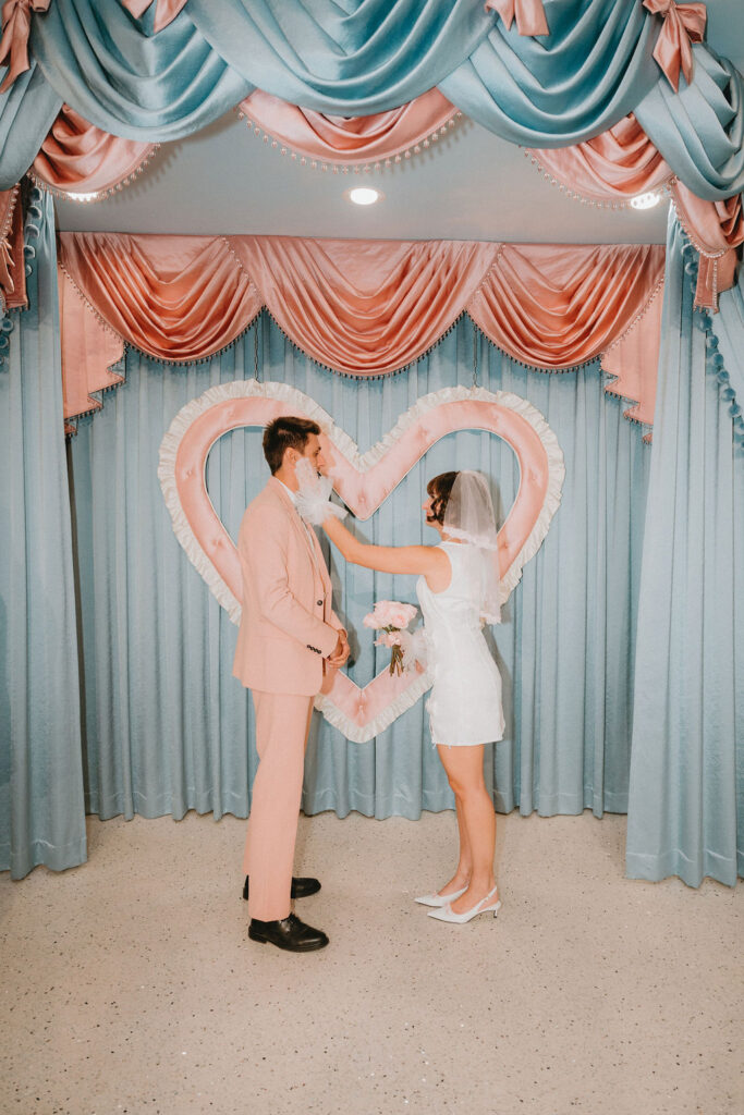 Couple sharing an intimate moment during their Sure Thing Too elopement in Las Vegas.
