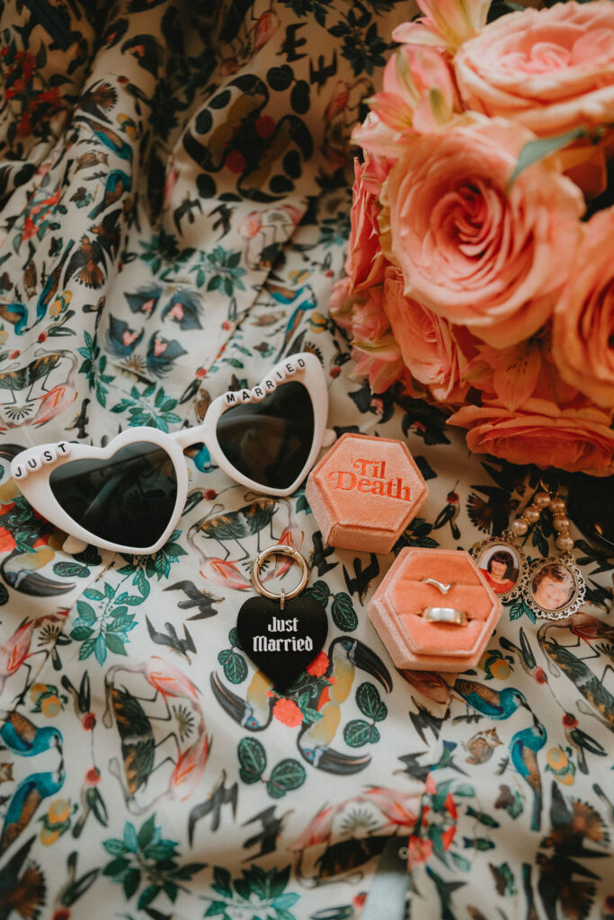 Candid moment of the couple celebrating their downtown Las Vegas wedding with playful energy.
