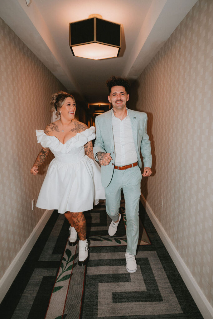 Newlyweds enjoying iconic downtown Las Vegas locations during their wedding celebration.
