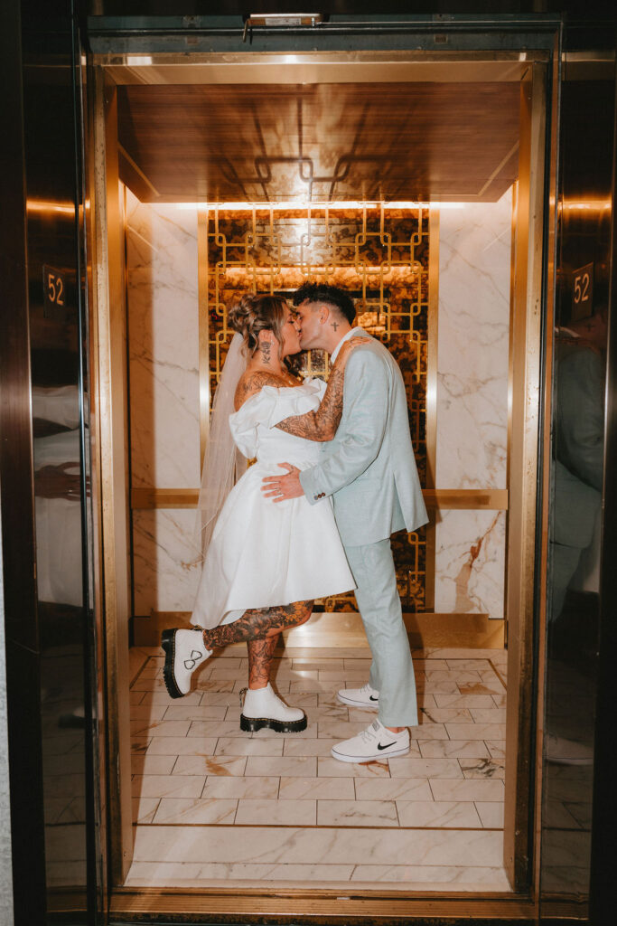 Newlyweds enjoying iconic downtown Las Vegas locations during their wedding celebration.