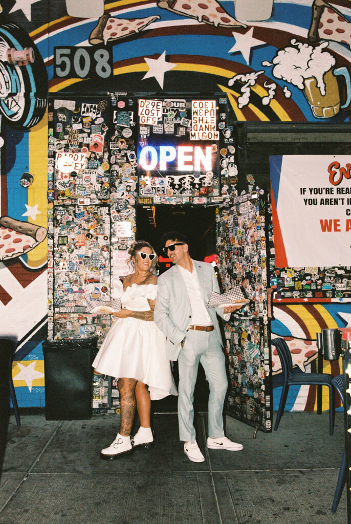 Newlyweds enjoying iconic downtown Las Vegas locations during their wedding celebration.
