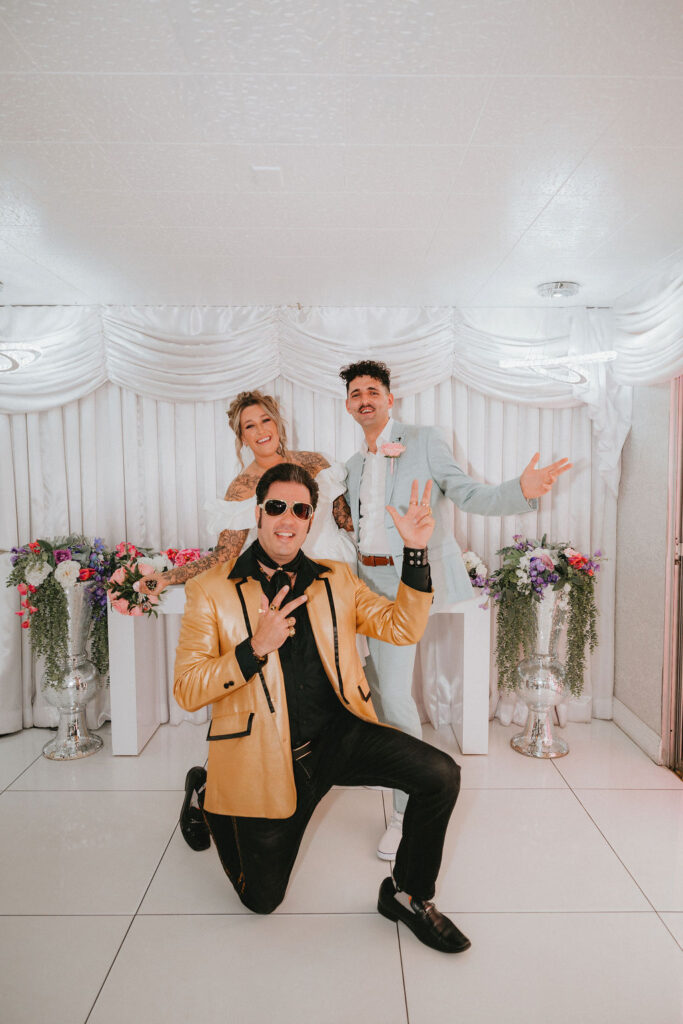 Newlyweds enjoying iconic downtown Las Vegas locations during their wedding celebration.