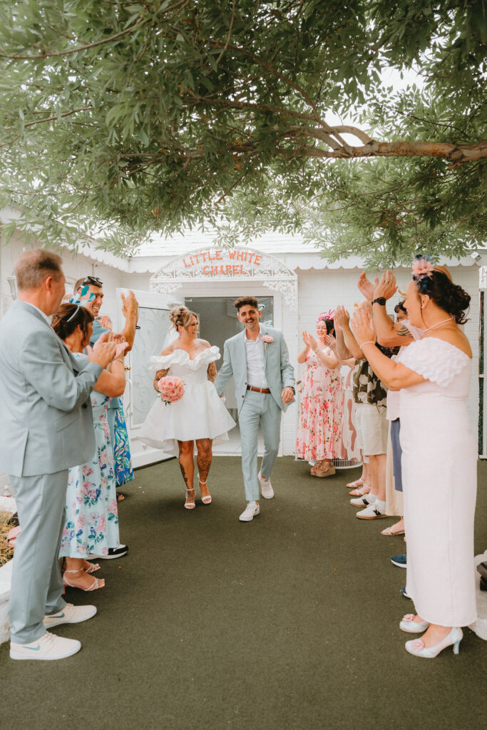 Newlyweds enjoying iconic downtown Las Vegas locations during their wedding celebration.
