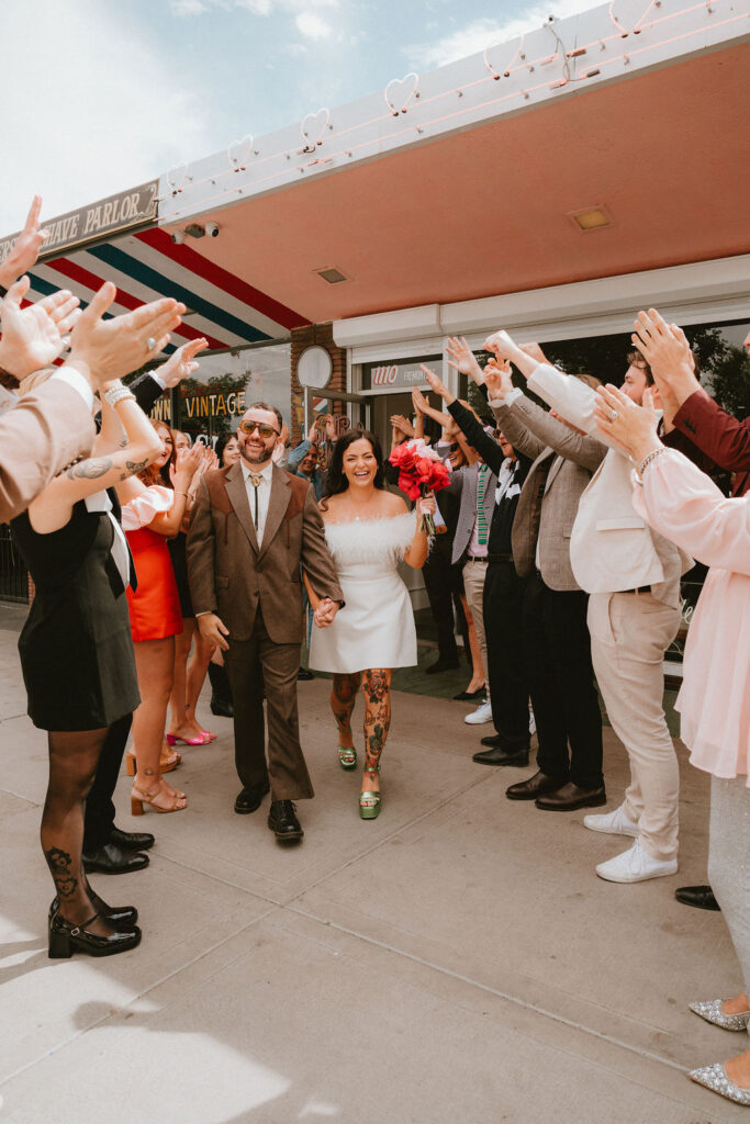 Candid moment from a sure thing chapel elopement filled with laughter and emotion.
