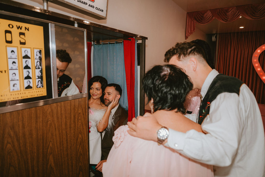 Candid moment from a sure thing chapel elopement filled with laughter and emotion.

