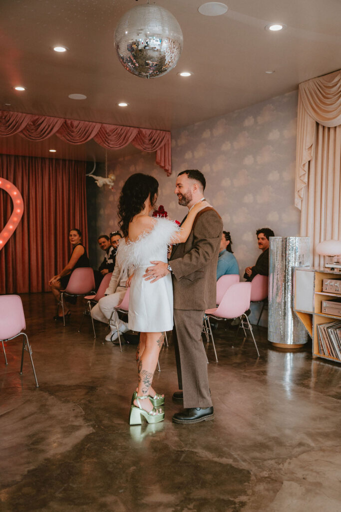 Candid moment from a sure thing chapel elopement filled with laughter and emotion.
