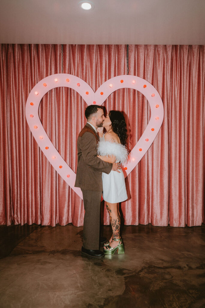 Film inspired wedding photo capturing a fun celebration.
