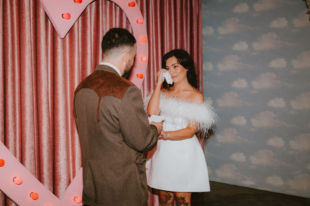 Film inspired wedding photo capturing a fun celebration.

