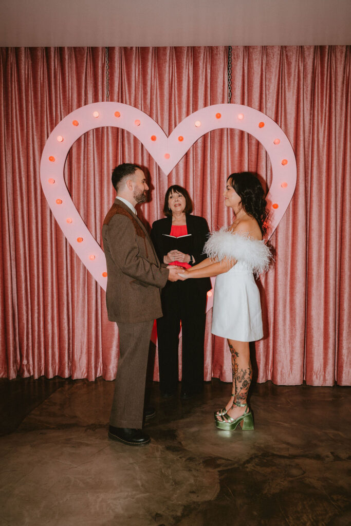 Candid moment from a sure thing chapel elopement filled with laughter and emotion.
