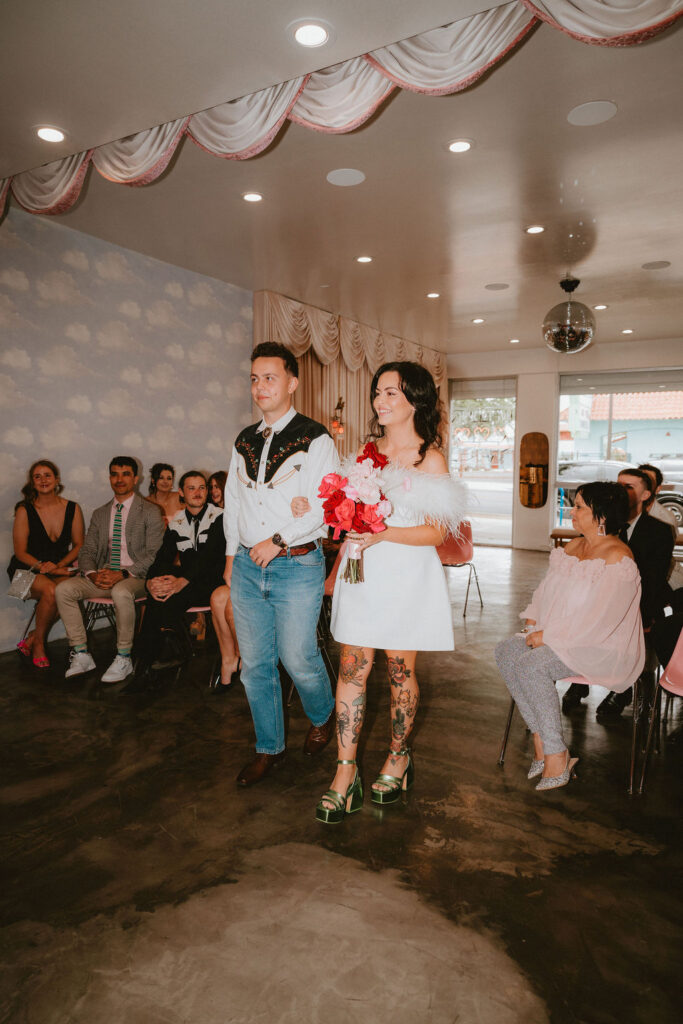 Candid moment from a sure thing chapel elopement filled with laughter and emotion.