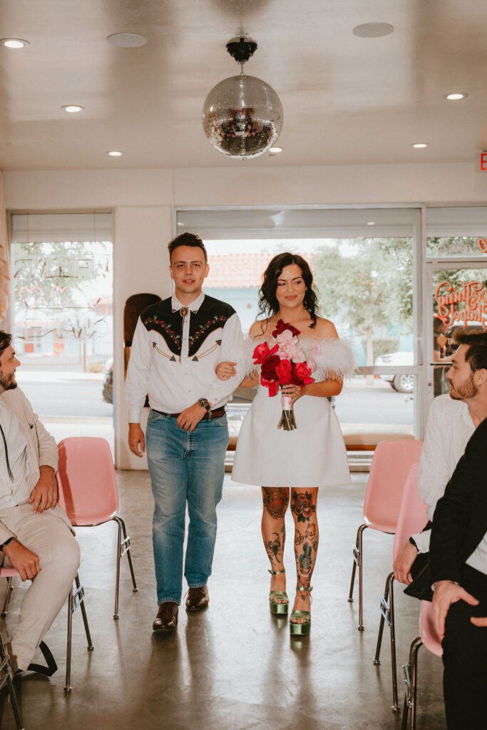 Film inspired wedding photo capturing a fun celebration.
