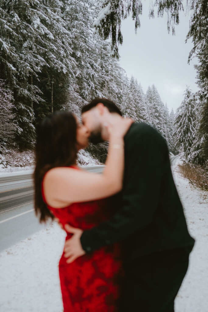 Adventurous Oregon Coast engagement session with the couple embracing the elements.
