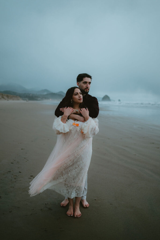 Candid Oregon Coast engagement session featuring natural light and coastal landscapes.