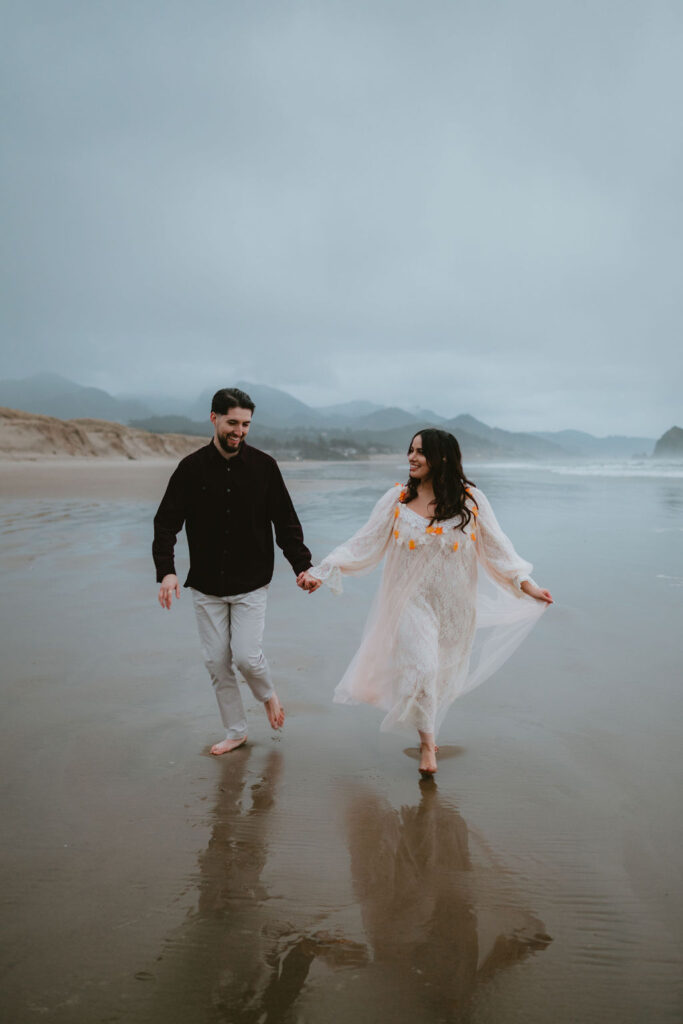 Romantic couples photos with overcast skies and ocean views.