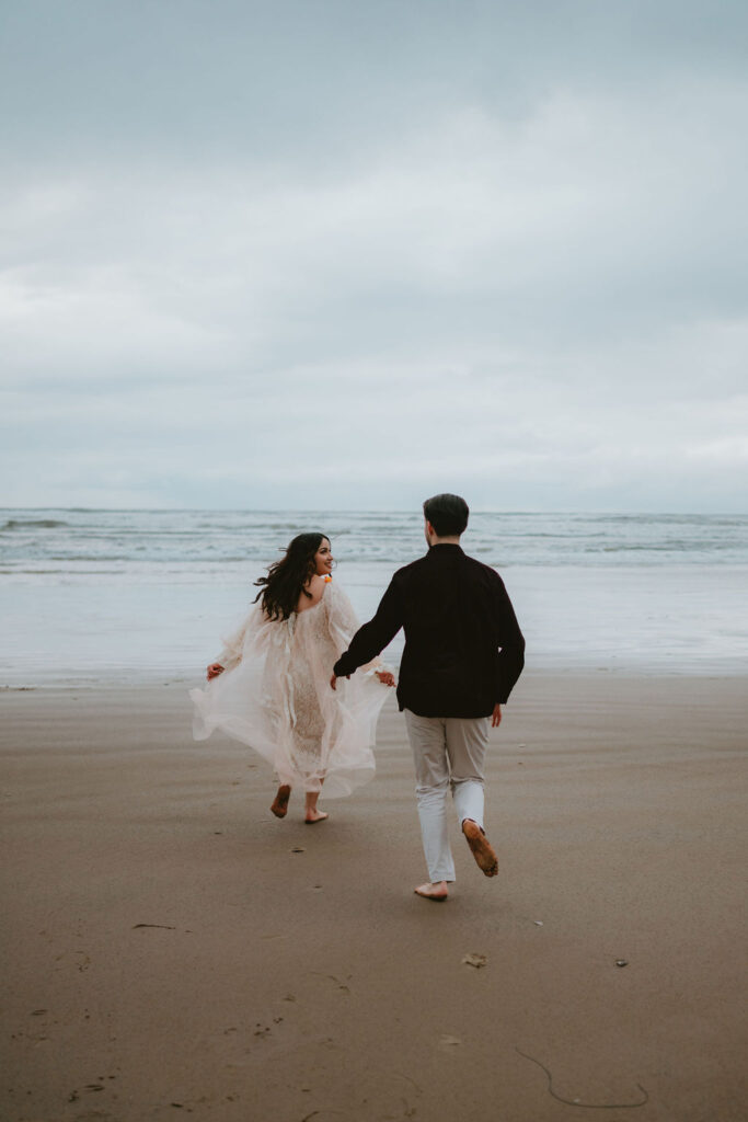 Candid Oregon Coast engagement session featuring natural light and coastal landscapes.