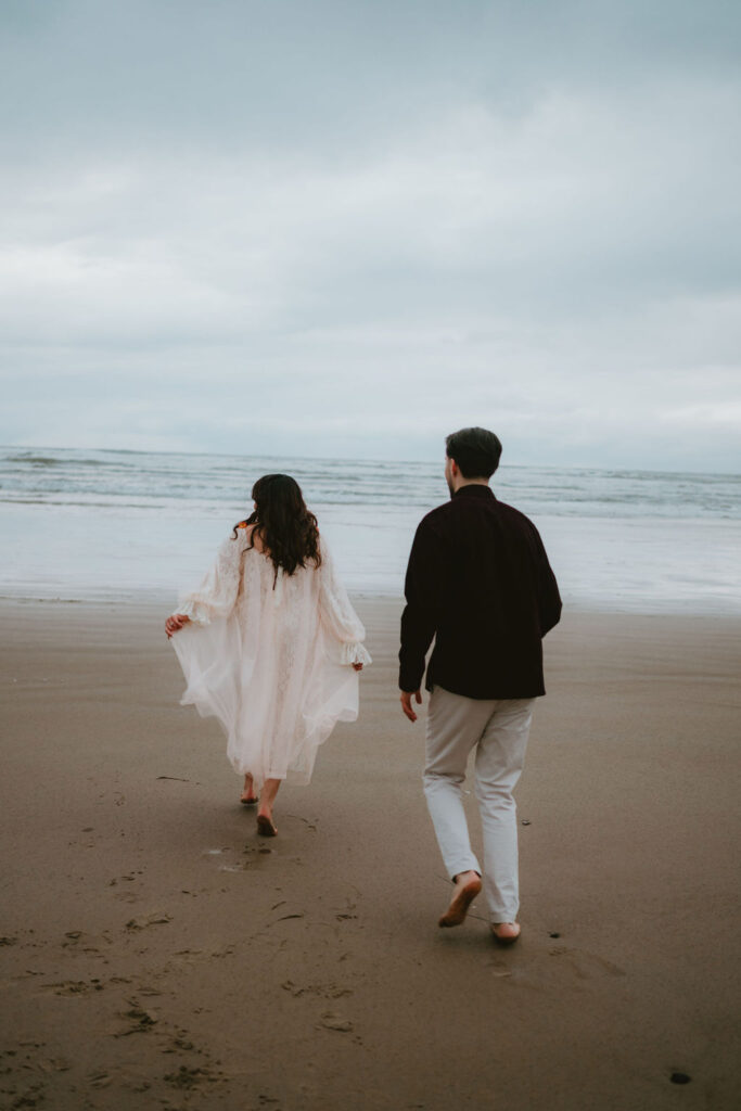 Candid Oregon Coast engagement session featuring natural light and coastal landscapes.