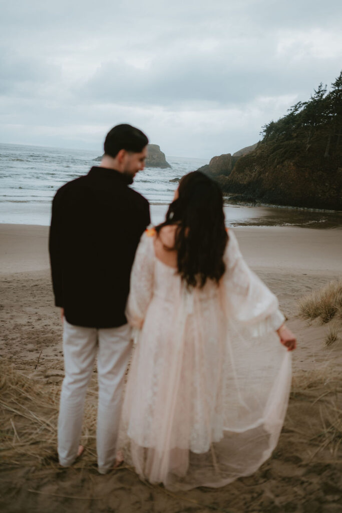 Candid Oregon Coast engagement session featuring natural light and coastal landscapes.