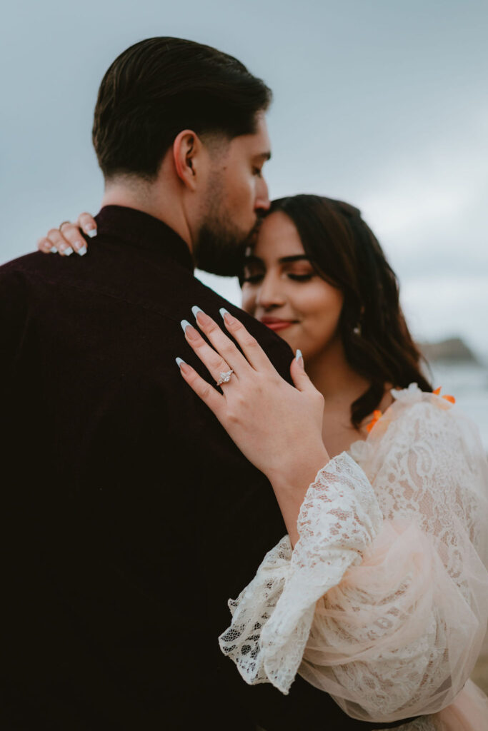Candid Oregon Coast engagement session featuring natural light and coastal landscapes.