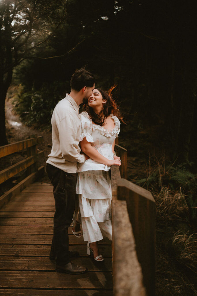 Engagement photos captured among fog and dramatic scenery