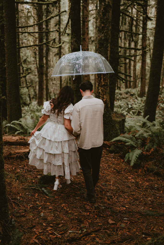 Engagement photos captured among fog and dramatic scenery