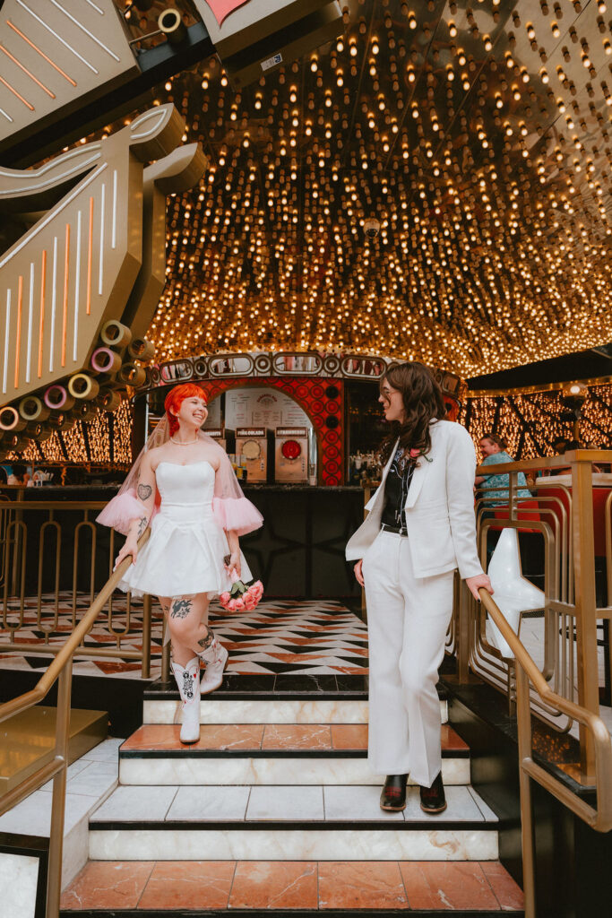 Candid photo of the couple holding hands after their ceremony at Little Church of the West.
