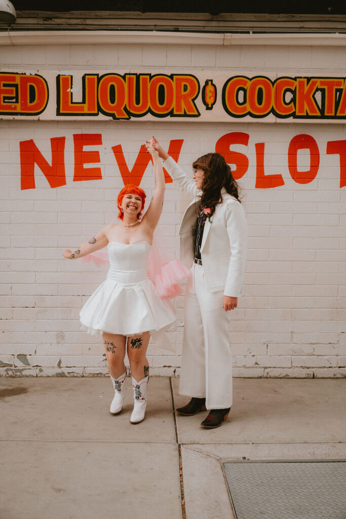 Candid photo of the couple holding hands after their ceremony at Little Church of the West.
