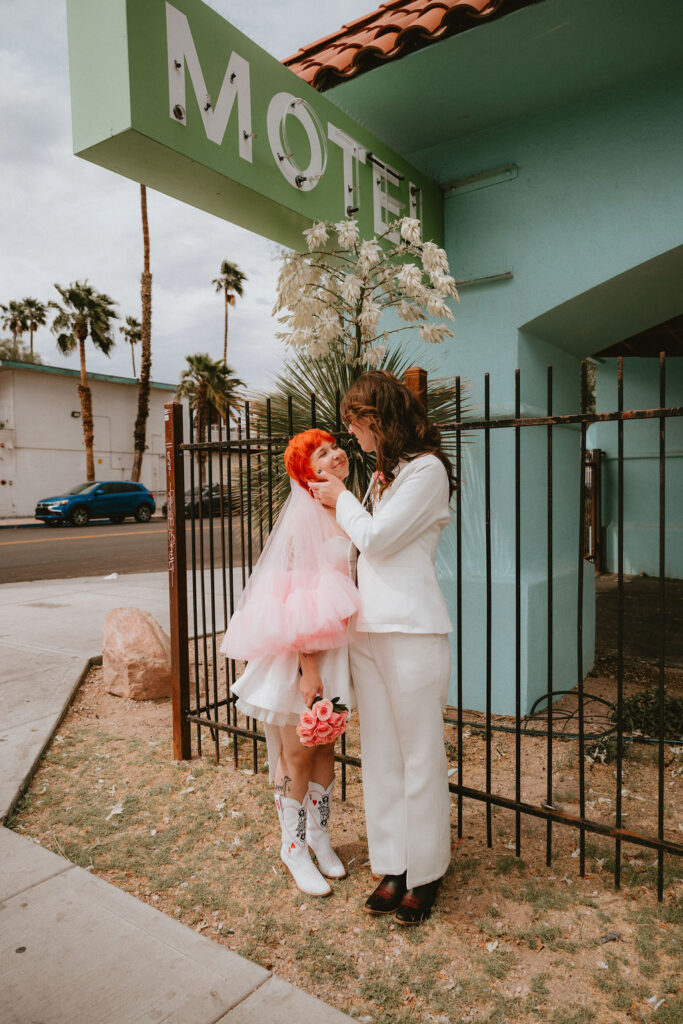 Candid photo of the couple holding hands after their ceremony at Little Church of the West.