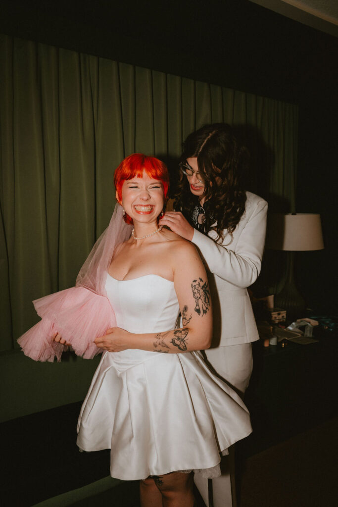 Zoe and Parker getting ready at Park MGM before their Little Church of the West wedding.
