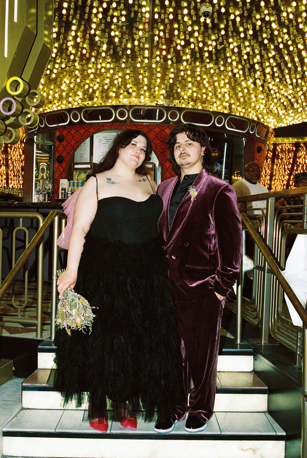 Bride and groom look at camera with straight face during 420 friendly Las Vegas elopement photos