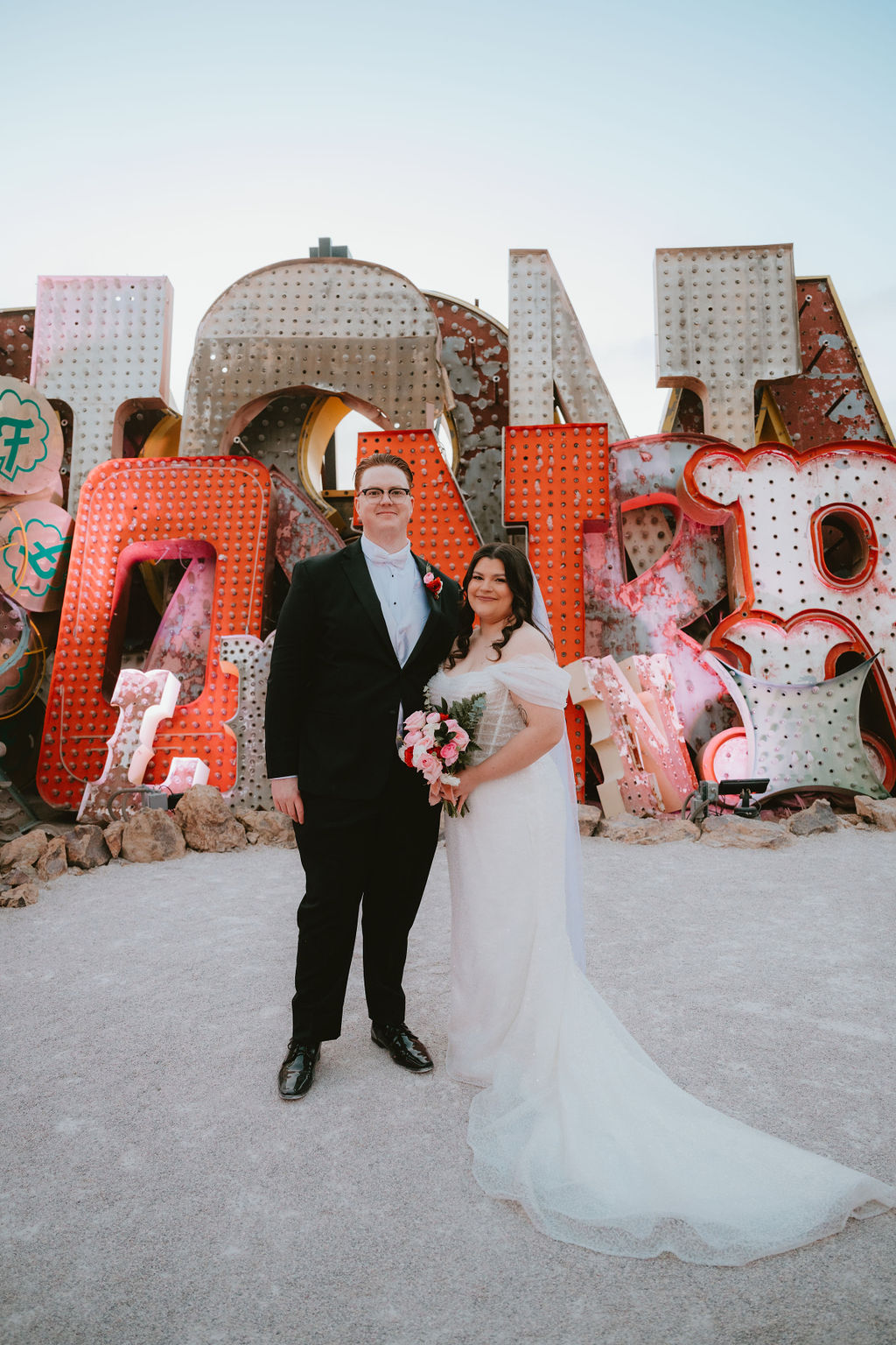 Bride and groom at their Neon Museum wedding