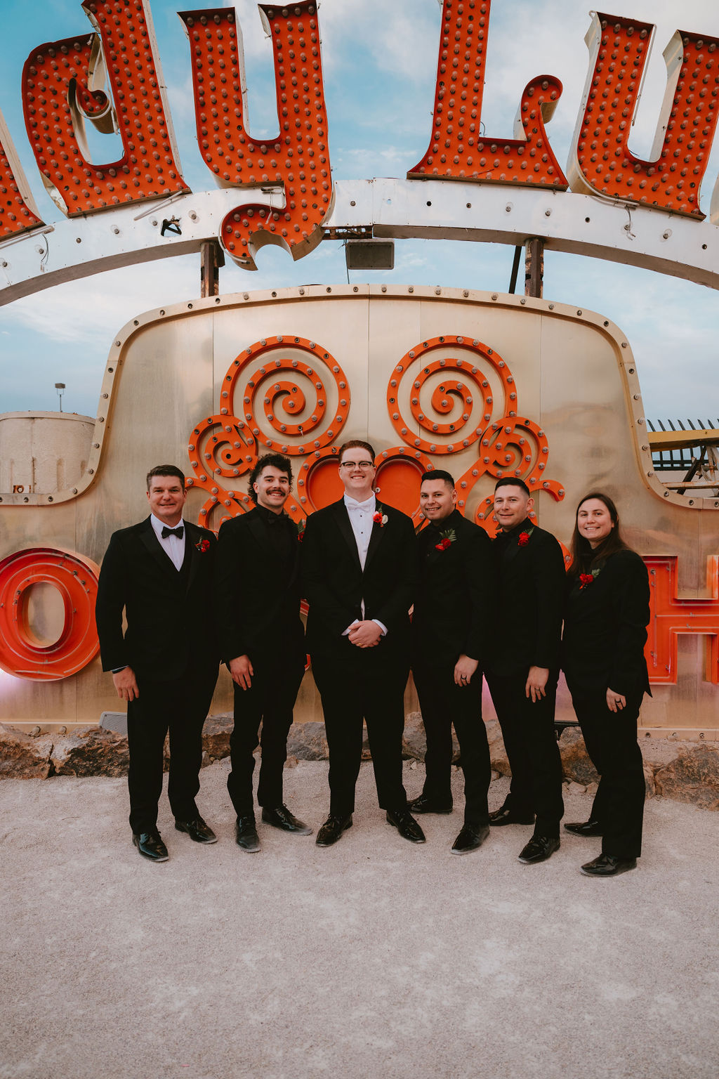 Groomsmen at the Neon Museum wedding