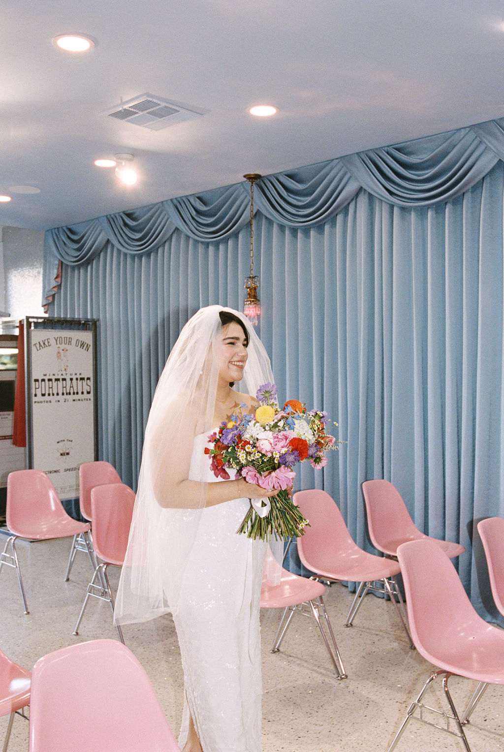 Bride walks down the aisle at the playful Las Vegas elopement