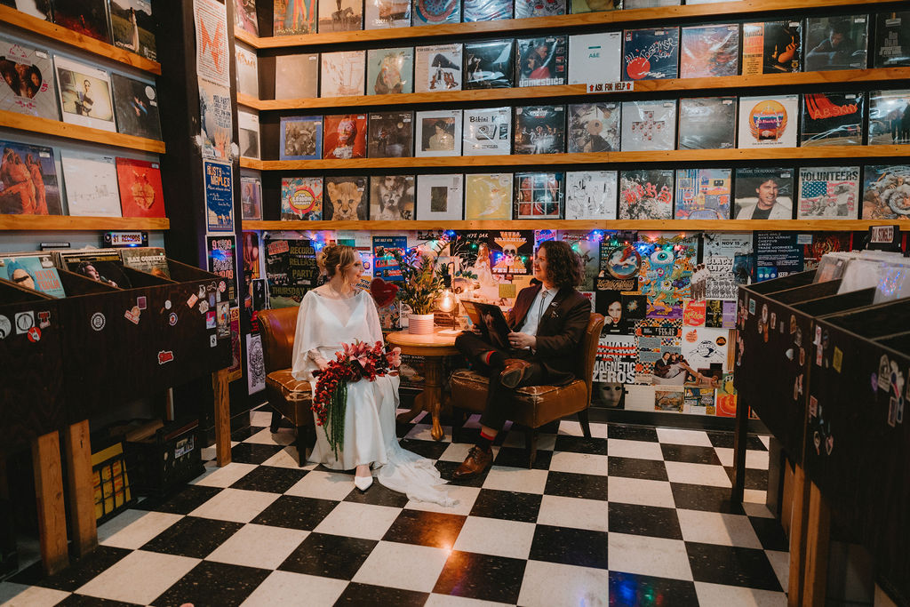 Bride and groom in a record shop in Las Vegas