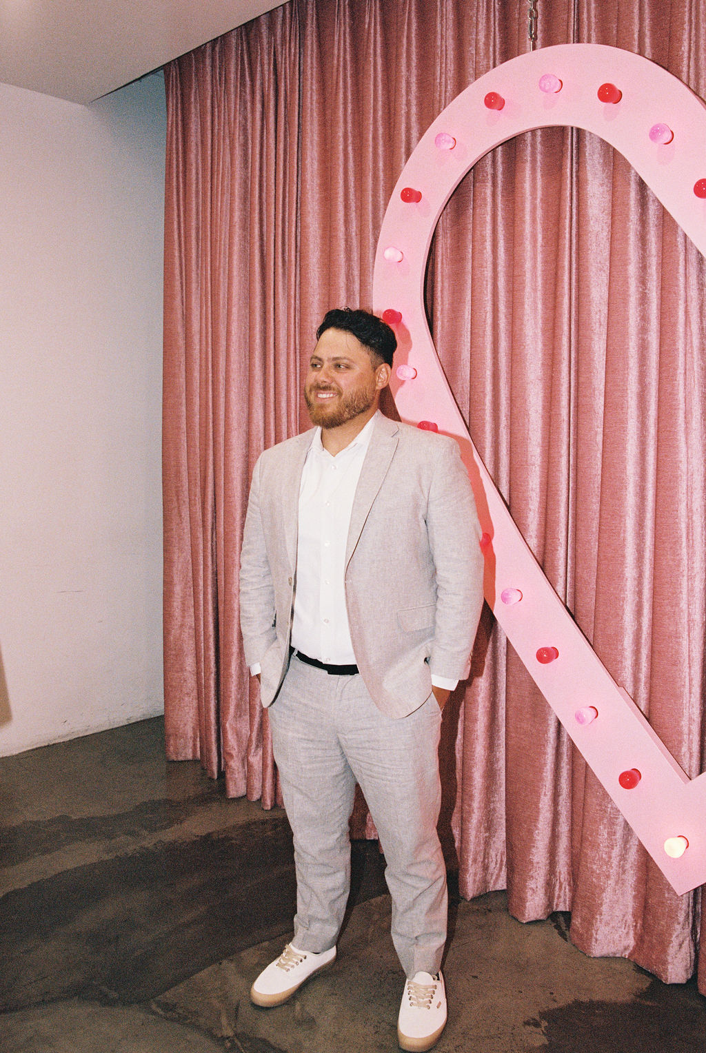 Groom reacts to bride at their wedding with Super 8 wedding film