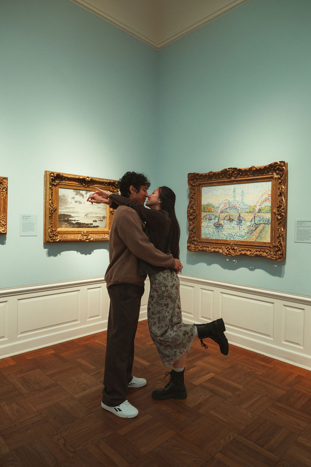 Couple embraces at their Portland Art Museum engagement photos